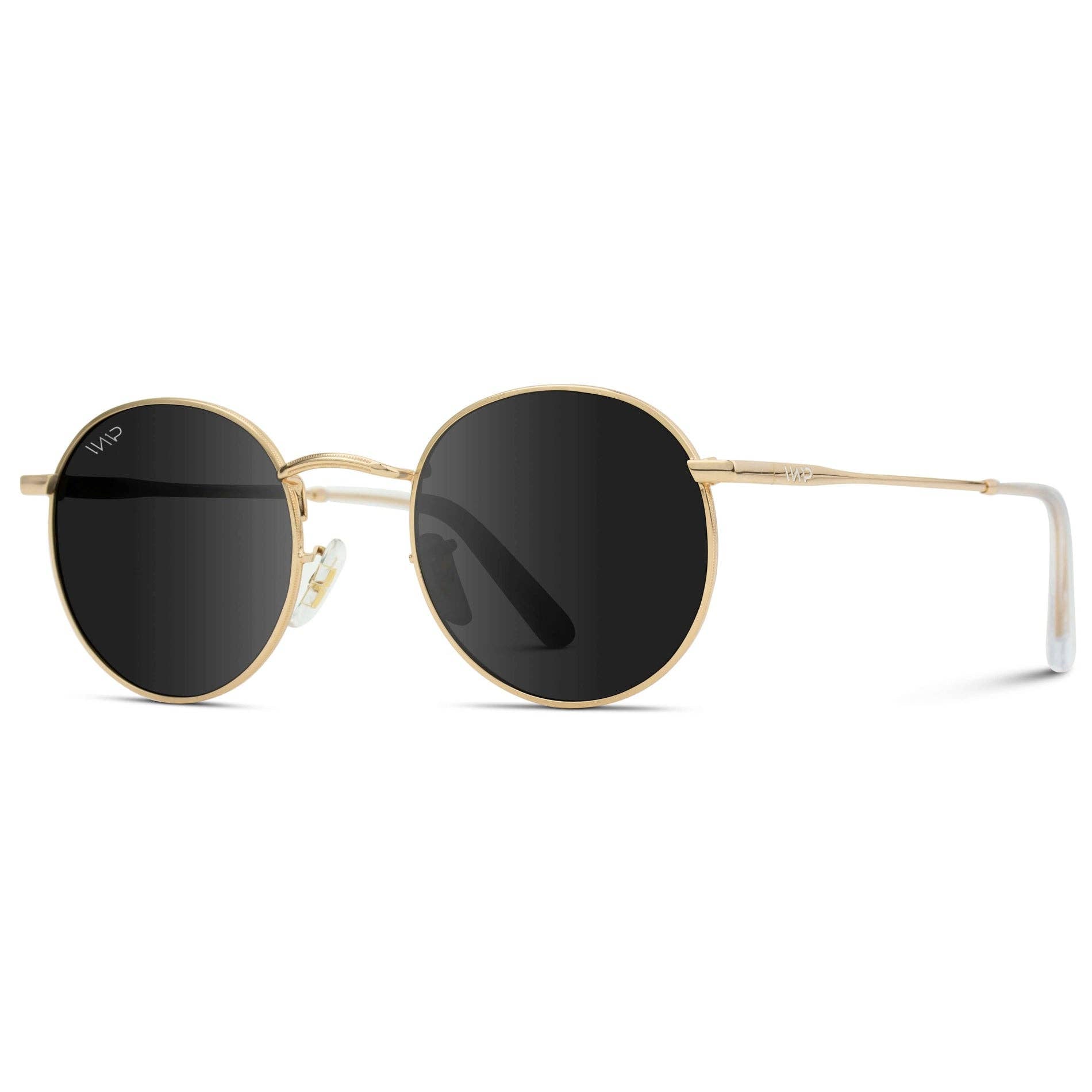 Round sunglasses with gold frame and black lenses on a white background