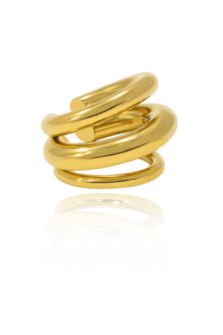 Gold spiral ear cuff on white background