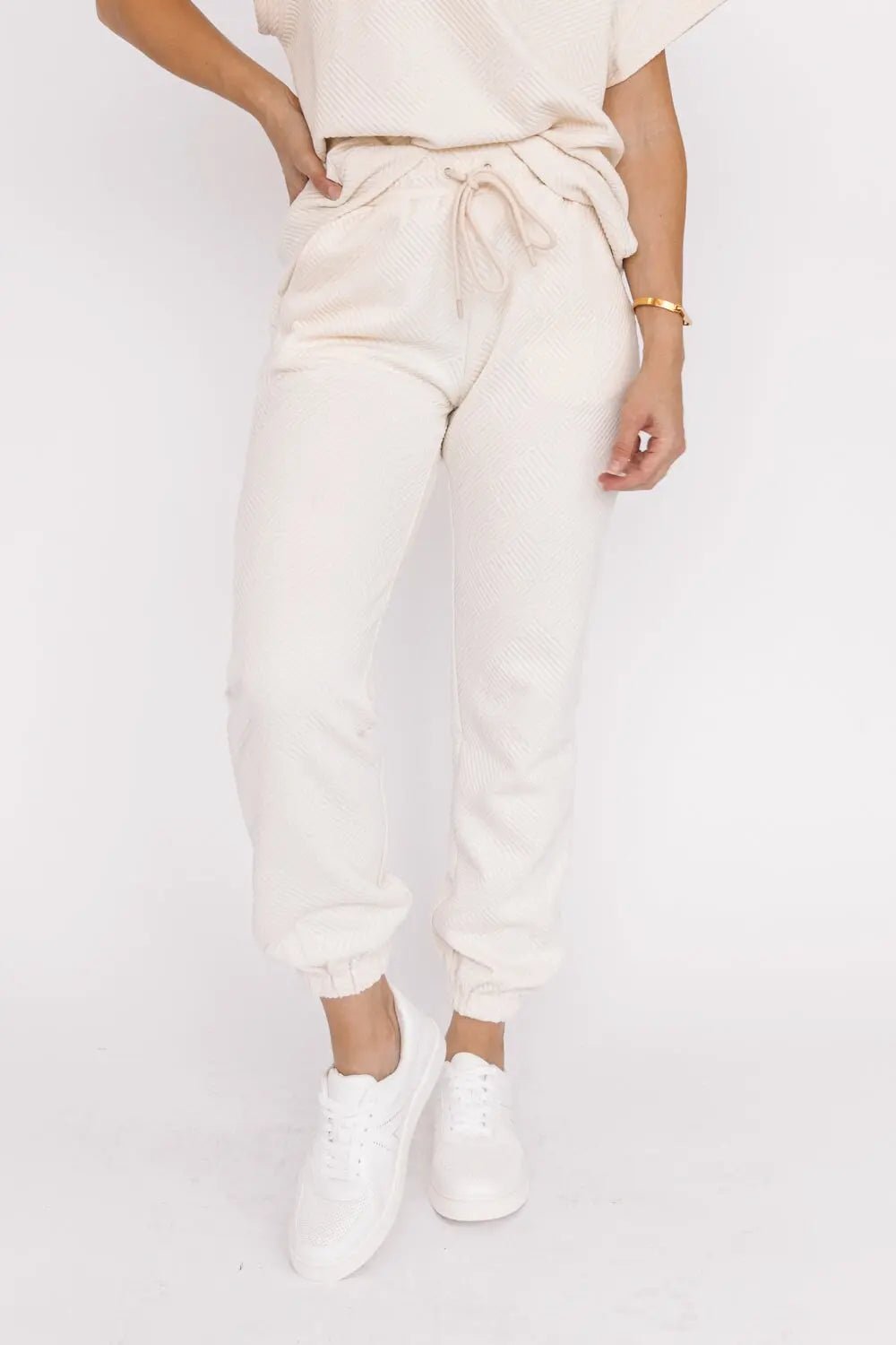 Weekend Vibe Cream Textured Joggers: Your Passport to Elevated Style
