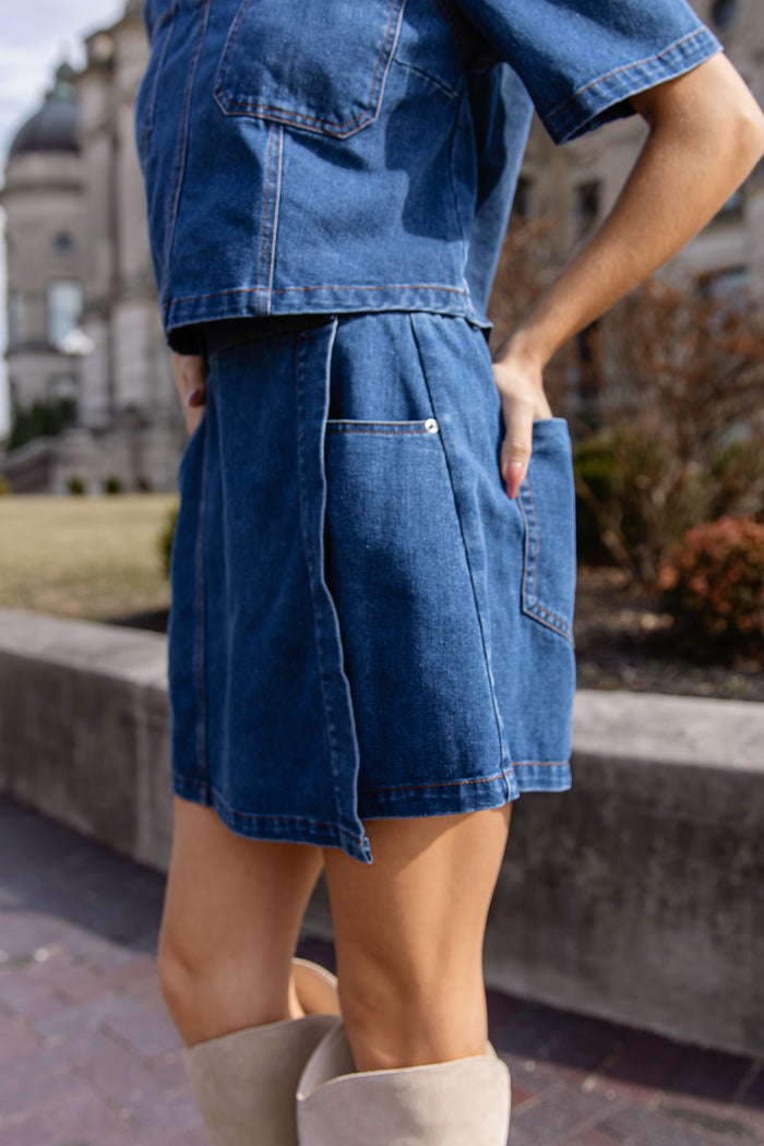 denim skort paired with casual top showing everyday styling