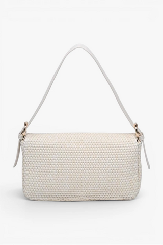 White woven handbag with a strap on a white background