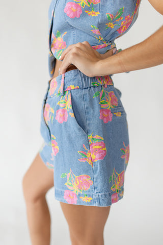 Side view of women's Jardin floral denim shorts showing functional side pocket detail and relaxed fit in lightweight 100% cotton floral denim