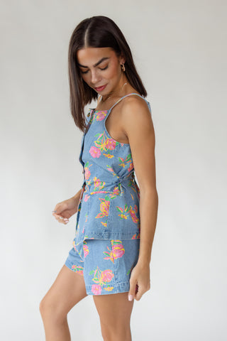 Side view of women's Jardin floral denim vest showing adjustable self-tie belt and relaxed lightweight silhouette