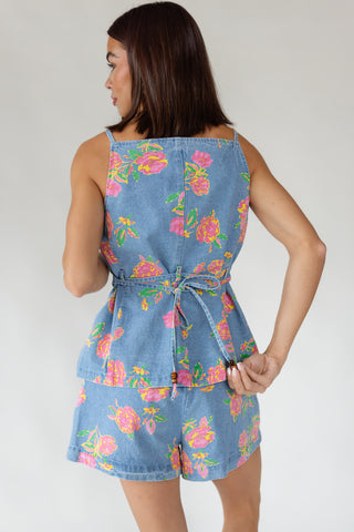 Self-tie waist belt detail on women's Jardin floral denim vest in lightweight 100% cotton