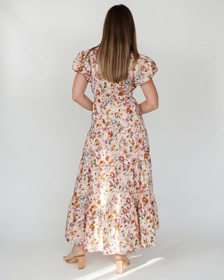 JO+CO Britton floral maxi dress in ecru with tiered skirt and short puff sleeves. Model is 5'8" wearing size S.
