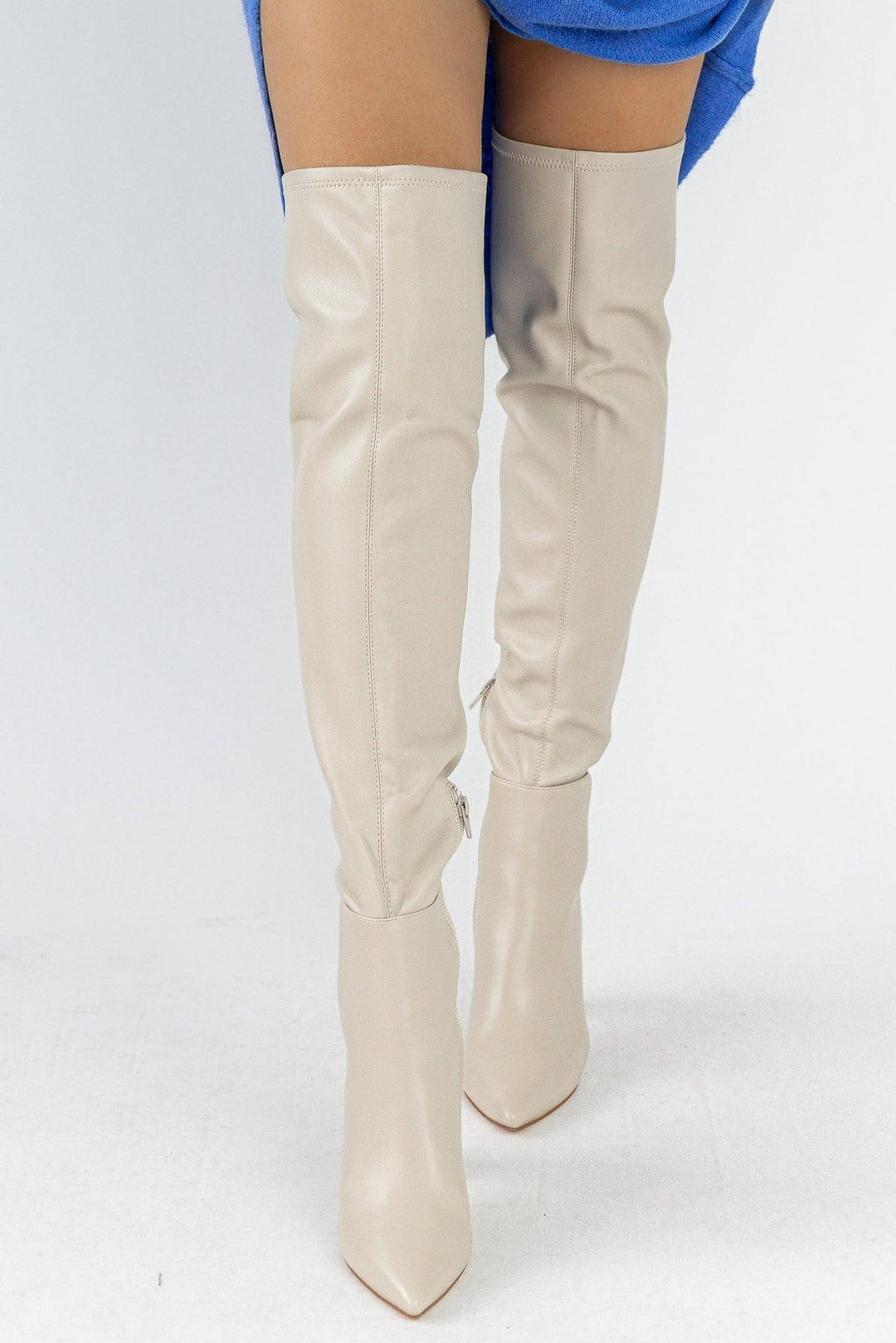 cream colored thigh high boots