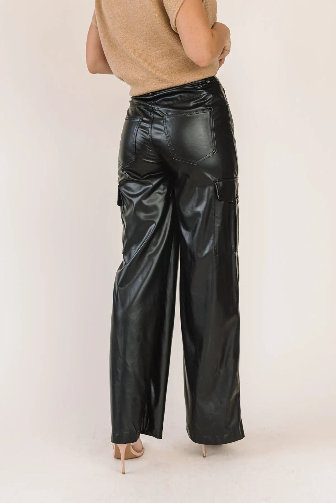 Trendy Girl Black Faux Leather Pants: Transition from Day to Night